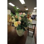 Vase of artificial flowers