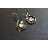 Pair of stainless steel and mother of pearl earrings