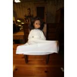 Doll and chair