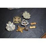 Border Cumberland and Westmorland Regiment cap badge and others