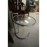 Adjustable glass top table