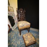 Carved oak chair and foot stool