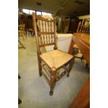 4 rush-seated spindle back chairs