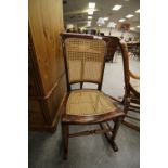 Small bergere rocking chair A/F, beech and cane