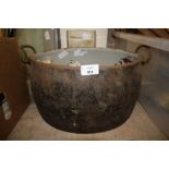 Cast metal pot and small tin bath