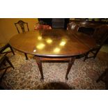 Early George III mahogany drop leaf oval dining table