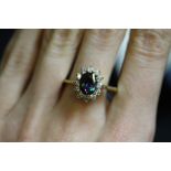 Gilt metal white and blue stone dress ring