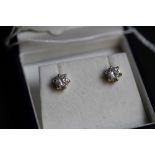 Pair of silver gilt and white stone solitaire earrings