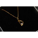 9ct gold diamond chip set 'D' pendant and fine 9ct gold chain 1.2grams gross weight