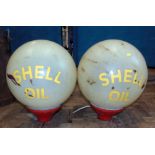 Pair of globe light fittings with Shell Oil attached labels. Condition reports are not availabe