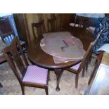 Edwardian Mahogany wind-out dining table on cabriole legs and six chairs Condition reports are not