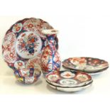 Japanese Imari vase, bowl, charger and two pairs of plates. Condition reports are not availabe for