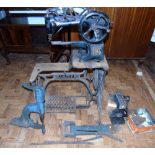 Singer treadle operated 29k stitching machine and gas powered thread waxer and leather punch.