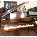 Baby grand piano by Chappell of London in mahogany, 137cm long and 142cm wide on taper legs.