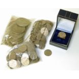 An assortment of various coinage to include George V florin and Elizabeth II sixpences etc