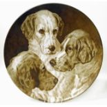 A Victorian charger depicting three dogs in sepia tone Condition reports are not availabe for our