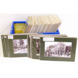 Large selection of assorted reproduction historical photographs of town and street views across