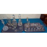 Four various cut glass decanters, six salts, two scent bottles with silver rims, five large wine