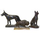 Three bronze figures, one bison, one German Shepherd and one Setter Condition reports are not