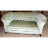 Edwardian button-back Chesterfield drop-end settee. Condition reports are not availabe for our