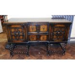Early 20th century oak Jacobean style dresser. Condition reports are not availabe for our