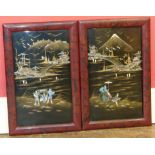 A pair of 20th century Japanese lacquered wall plaques Condition reports are not availabe for our