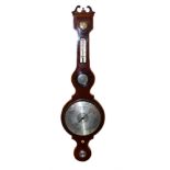 A 19th century mahogany wheel barometer by C. C. G & Co 34 St. John's Lane, London. The mahogany