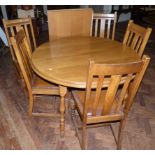 Set of five early 20th century oak dining chairs and modern circular kitchen table complete with