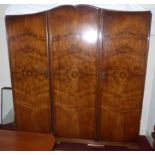 Walnut triple wardrobe by Waring & Gillow. Condition reports are not available for our Interiors