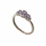 A tanzanite 3-stone platinum ring Condition reports are not available for our Interiors Sales.