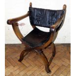 Oak continental X frame chair with impressed leather depicting a deer stalking scene. Condition