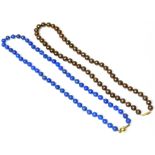 A row of Polish lapis lazuli beads with 18ct gold clasp and a row of chocolate cultured pearls