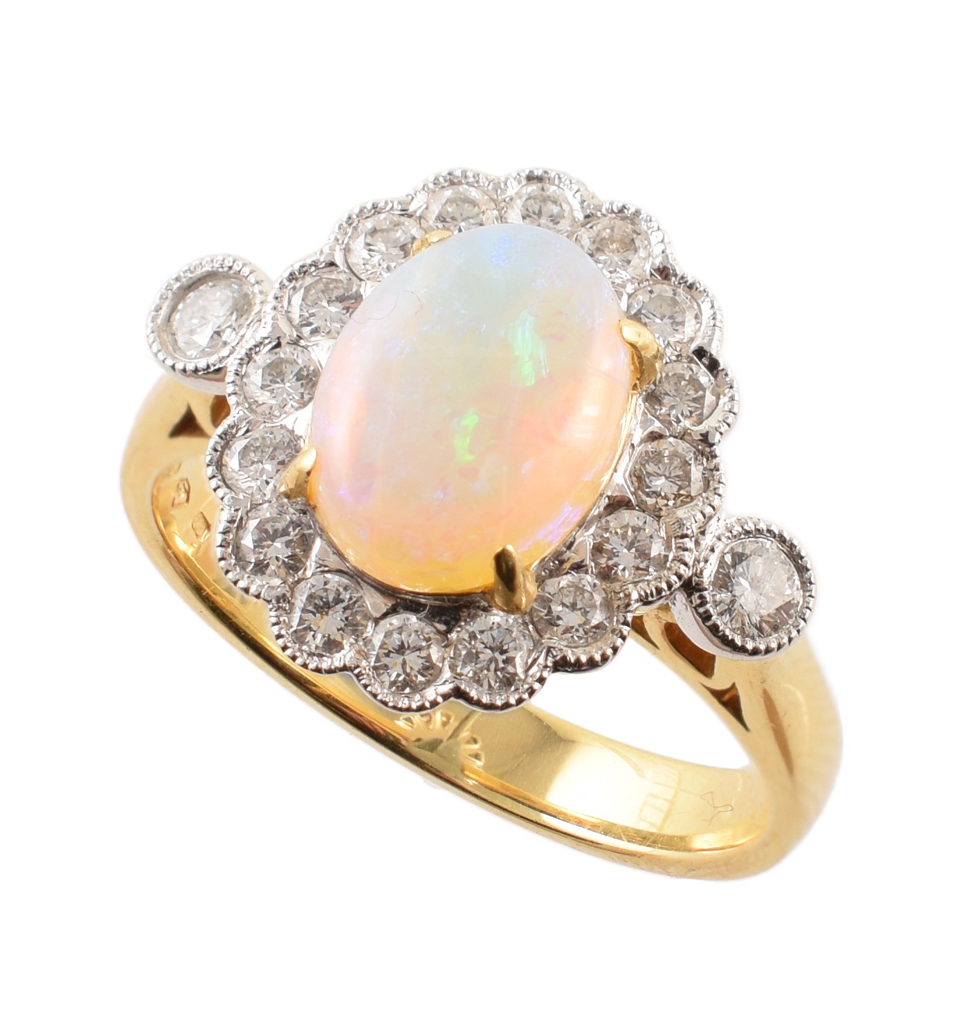 Opal and diamond oval cluster 18ct gold ring with diamond set shoulders , the oval cabochon cut opal