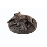 A bronze relief of mastiff and puppies signed W. Wolfe. 16 x 35 cm. For condition reports go to