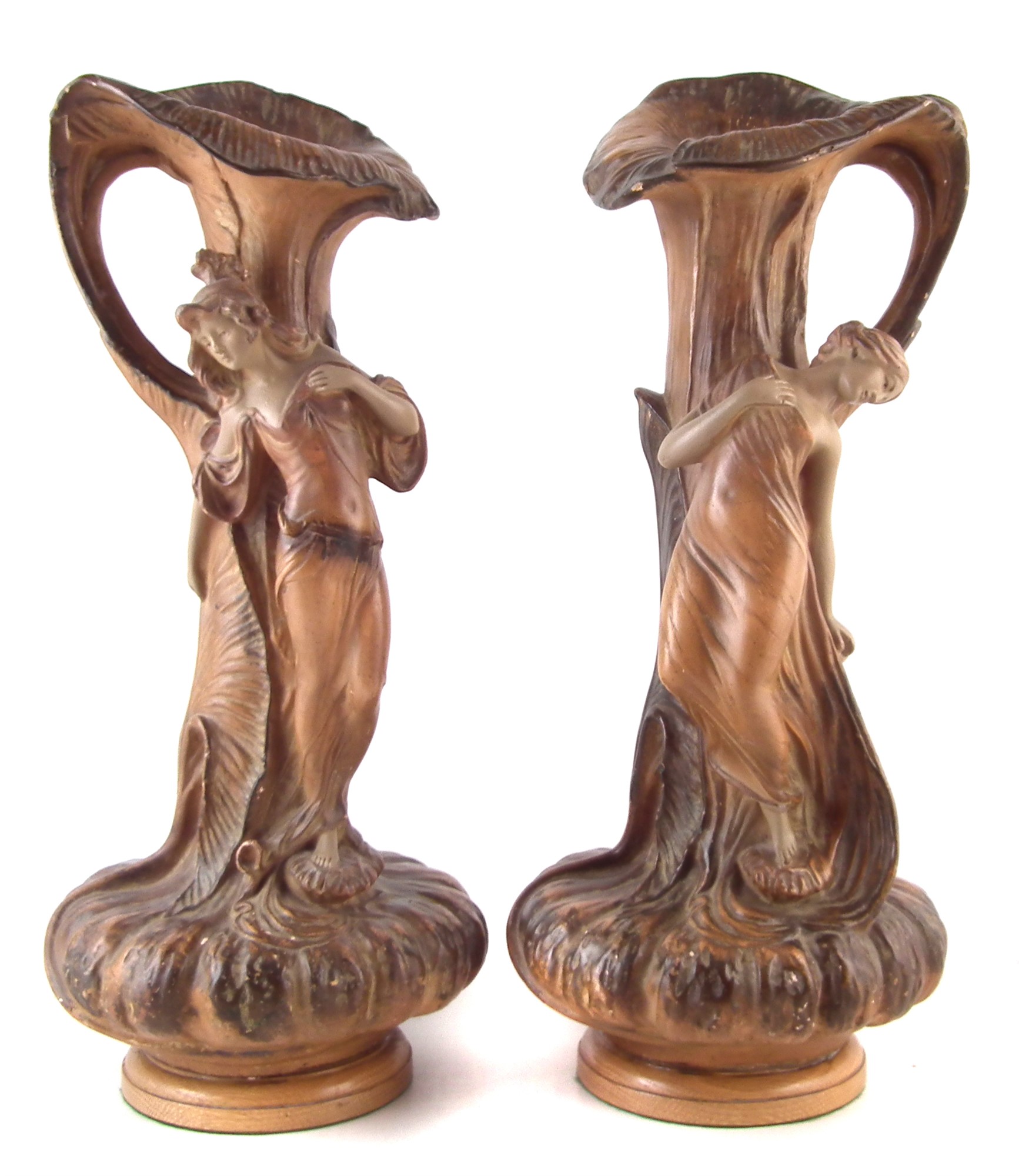 Pair of Painted plaster Art Nouveau ewers, moulded as gourds with leafwork spouts and handles,