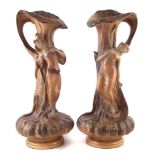 Pair of Painted plaster Art Nouveau ewers, moulded as gourds with leafwork spouts and handles,