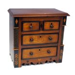 Mid 19th century North Wales apprentice chest, fitted two short and two long drawers with turned