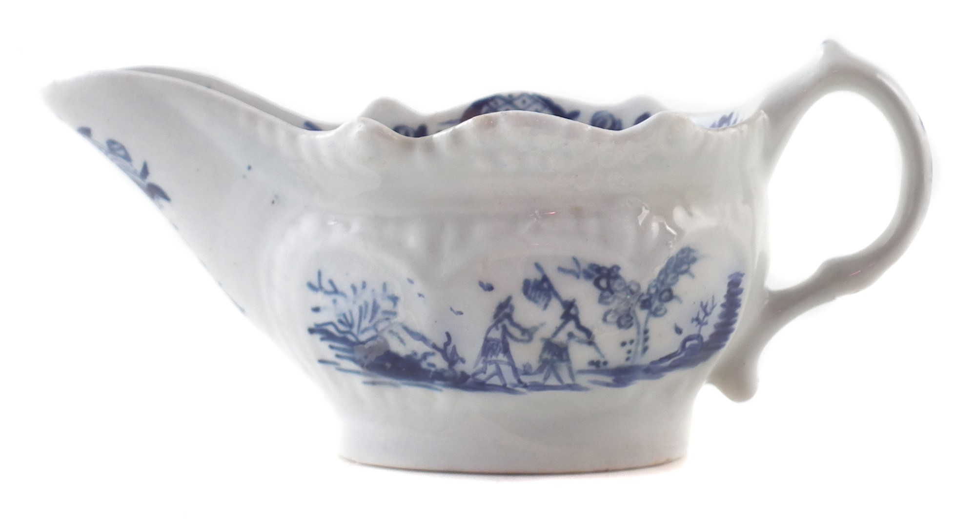 Lowestoft creamboat circa 1775 painted with a version of Two Porter landscape pattern, 11cm long For