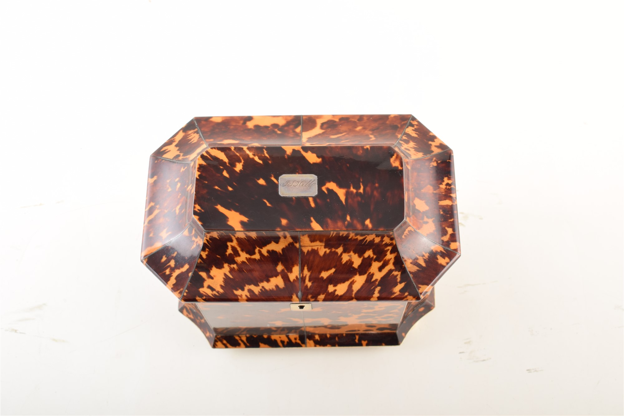 A 19th century tortoiseshell veneered tea caddy. With caddy top and concave edges, on ivory feet - Image 2 of 5