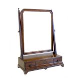 George III mahogany dressing table mirror, the rectangular glass with moulded frame on stick