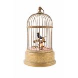 A Reuge Music Voliere de la Cour, Singing Birds in birdcage. The antique style cage with two