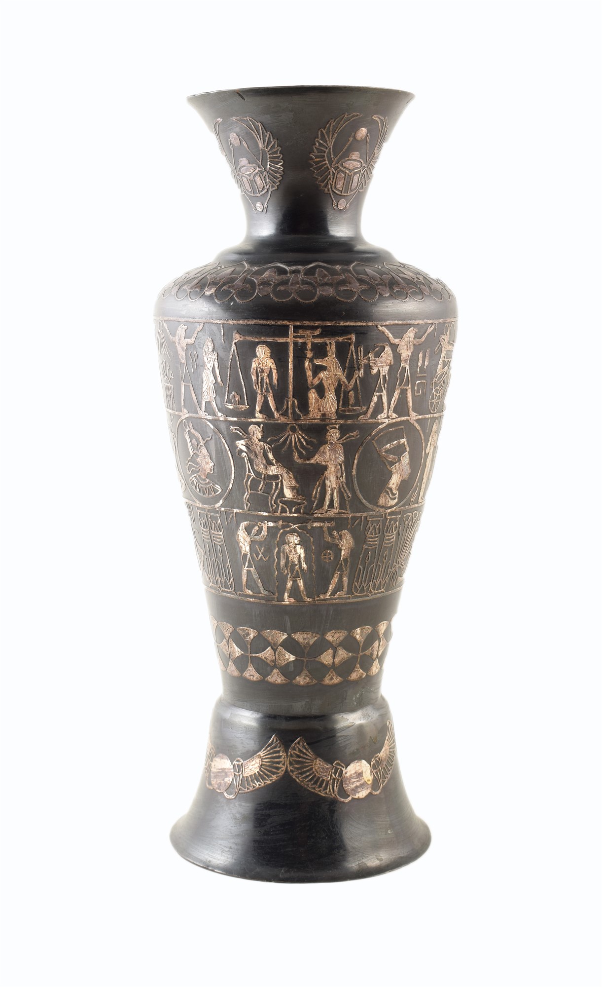 A 20th century oxidized copper vase with white metal overlay depicting scenes of Egyptian mythology.