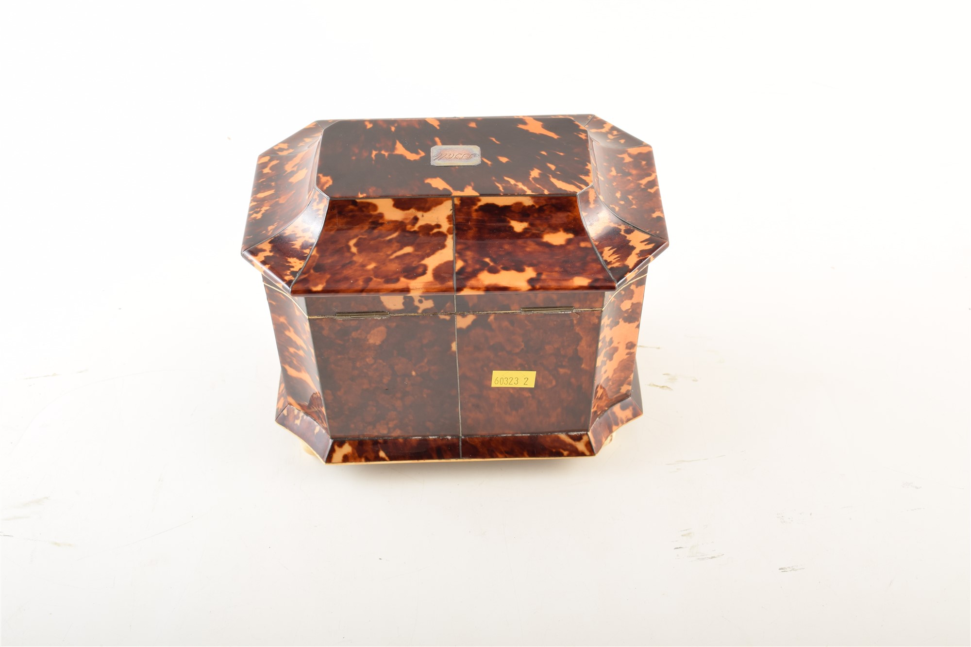 A 19th century tortoiseshell veneered tea caddy. With caddy top and concave edges, on ivory feet - Image 3 of 5