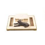 A bronze desk tray veneered in white stone and mounted with a bronze mastiff. 8 x 36 cm. For