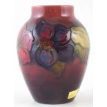 Moorcroft flambe vase, decorated with clematis pattern, impressed marks to base, 12cm high For