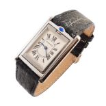 Lady's Cartier reverso steel watch on leather strap , single rectangular ivory coloured dial,