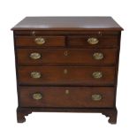 George III mahogany chest of two short and three long graduated drawers, rectangular top with ogee