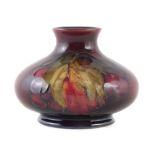 Moorcroft flambe vase, decorated with leaves and berries pattern, impressed marks to base, 7.5cm