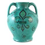 Della Robbia twin handled vase, painted with a fleur-de-lis, incised marks and 999 to base, 30cm