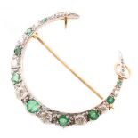 Emerald and diamond 18ct yellow and white gold crescent brooch , total of 10 round mixed cut